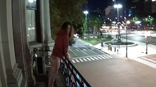Outdoor public space pissing from a balcony in America