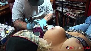 Shyla Stylez gets tattooed while playing with her boobs