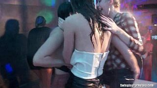 Slutty gal dancing erotically in a club